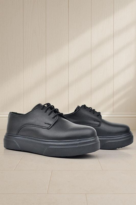 حذاء كلاسيكي للأطفال من راكر بلاس ديربي، مصنوع من الجلد الطبيعي باللون الأسود غير اللامع، ذو نعل عالٍ - 1